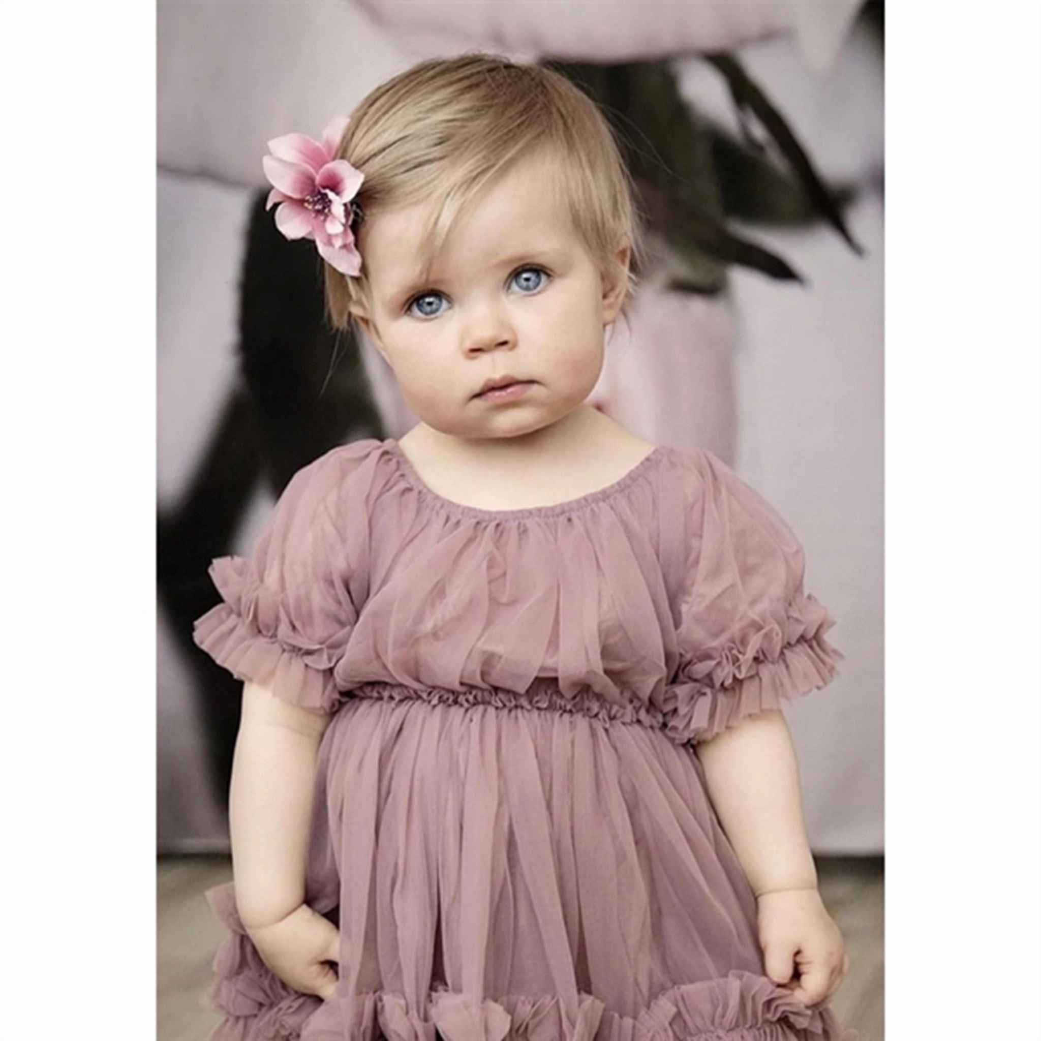 Dolly by Le Petit Frilly Dress Mauve Soft Contour button detail