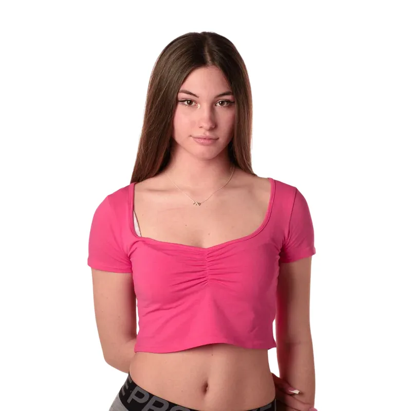 XT Studio maglietta manica corta scollata da donna. Colore fucsia Cool Layering Durable Colorfast Finish