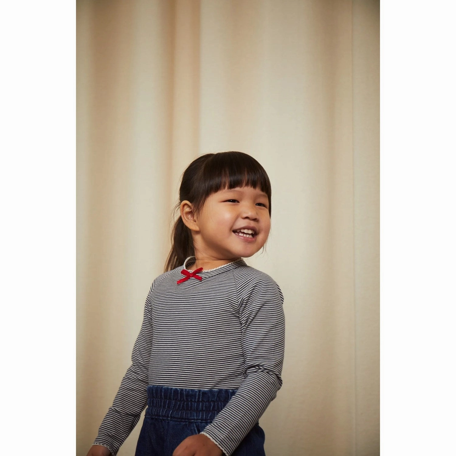 Edgy Design Smooth zipper closure COPENHAGEN COLORS Navy/Cream Stripe Striped Ls Tee W. Bow