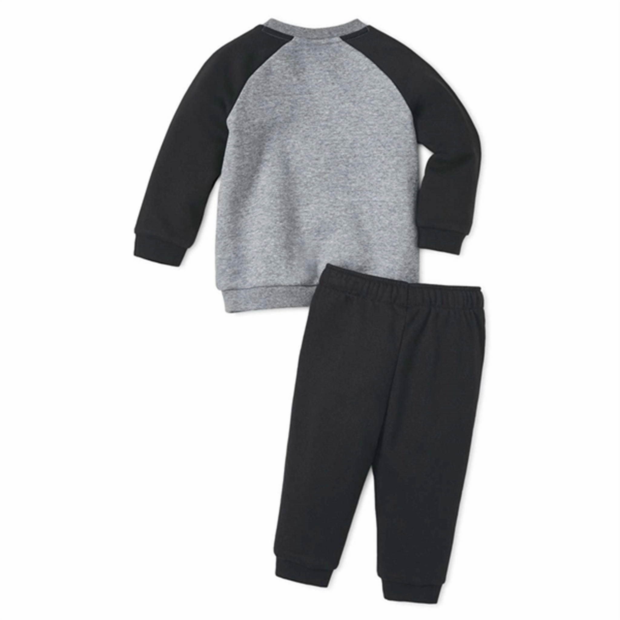 HighEnergyReturnFoam Windresistant outer shell Puma Minicats Ess Raglan Jogger Set Black