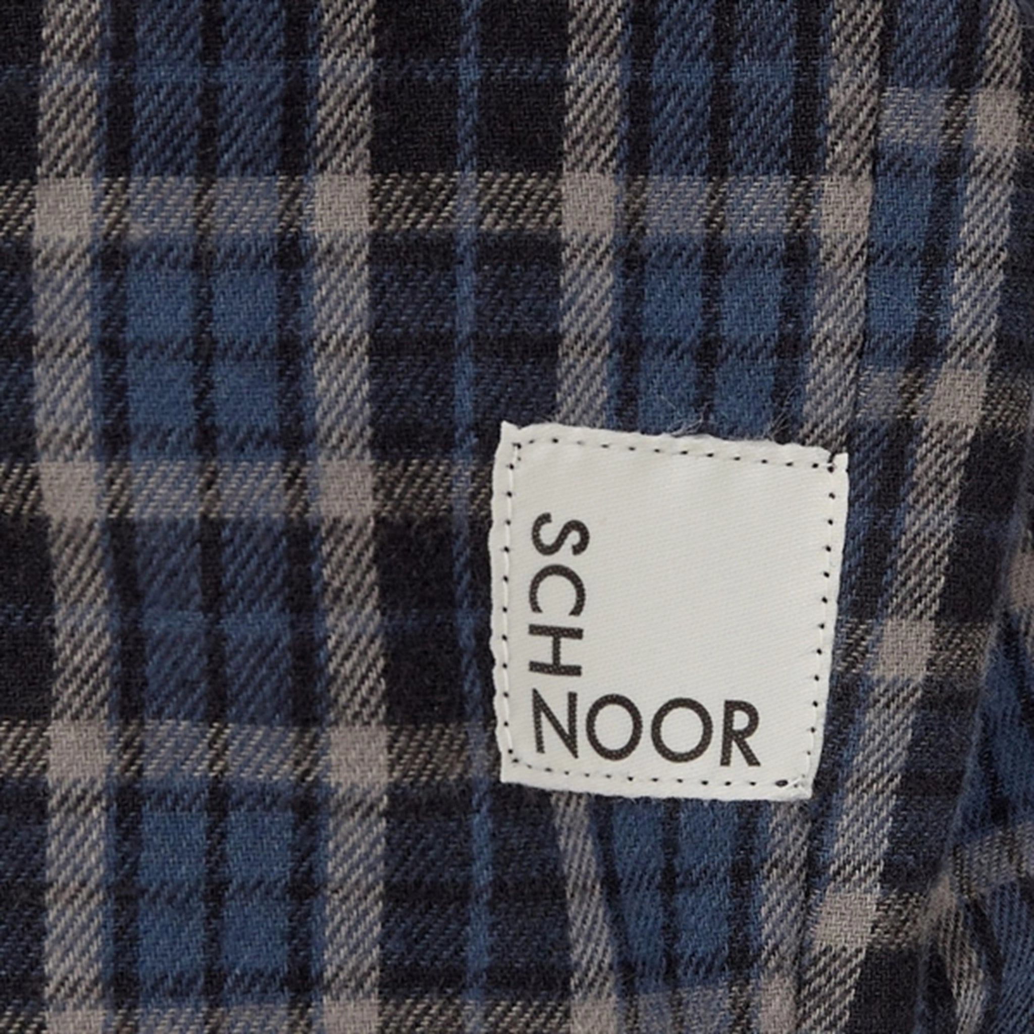 Sofie Schnoor Blue Shirt Neutral Colors Spring Break