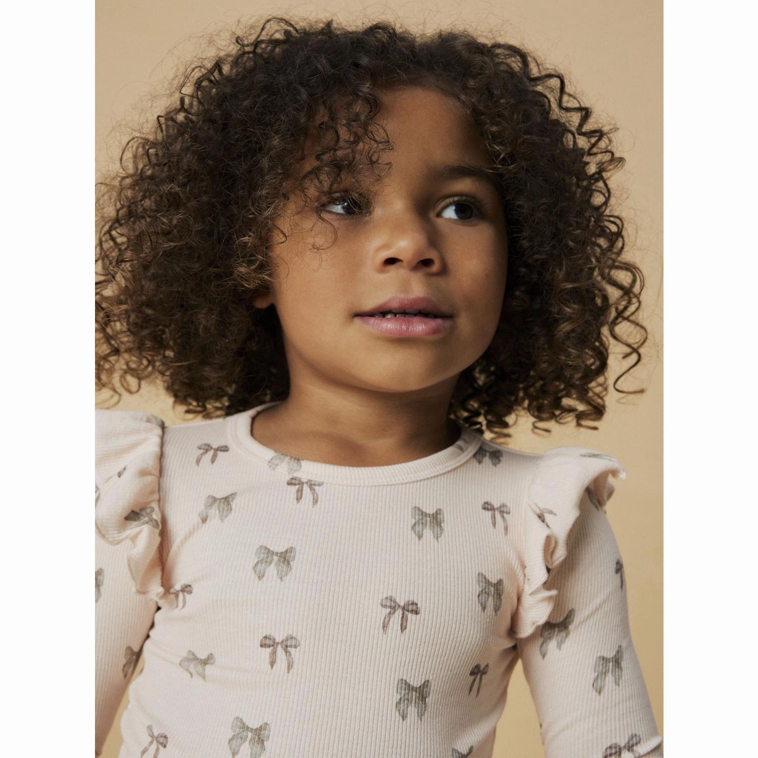 Lil'Atelier Silver Peony Bow Nmfgavo Eko Ls Slim Top Lil Noos Textured Finish